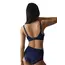 Szeroki pas obwodu i potrójne zapięcie na haftki w biustonoszu Triumph Ladyform Soft